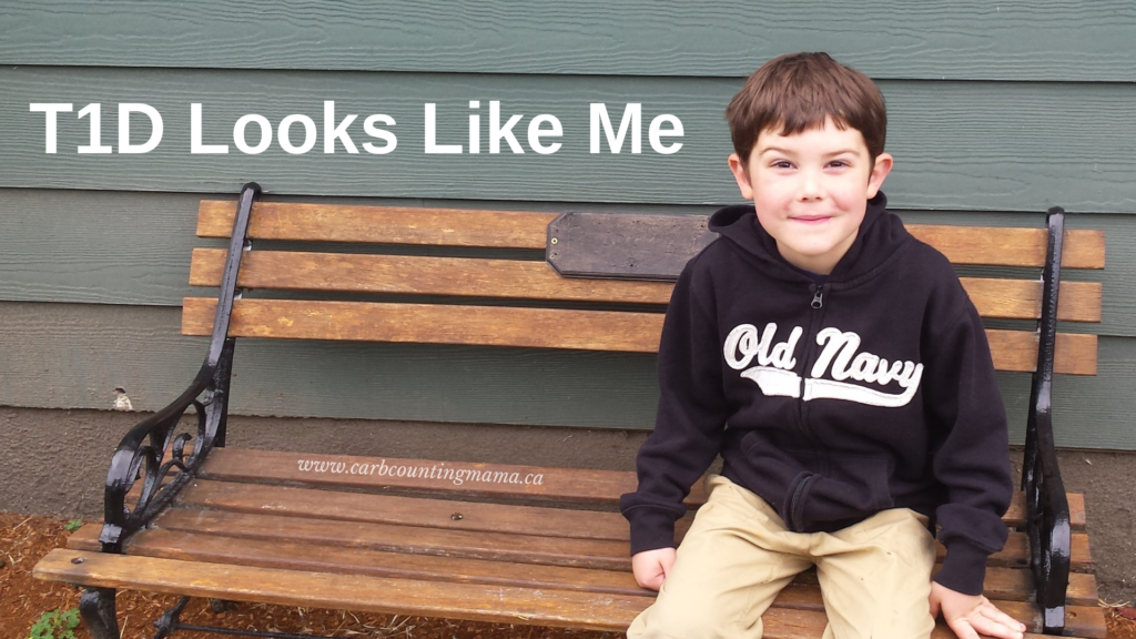 Young boy who has type 1 diabetes sitting on a wooden bench. 

White text reads: "T1D Looks Like Me"